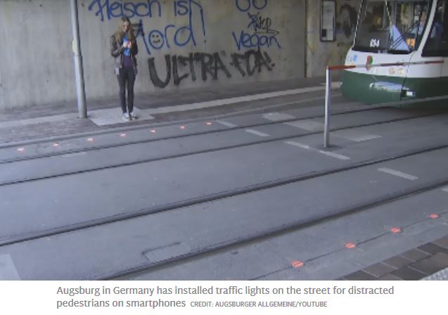Street-embedded lighting assists texters