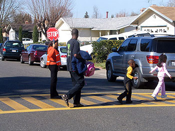 Crossing guard and kids