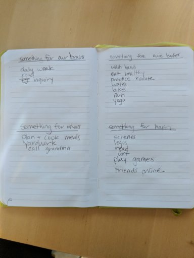 child's daily schedule written out in a lined notebook