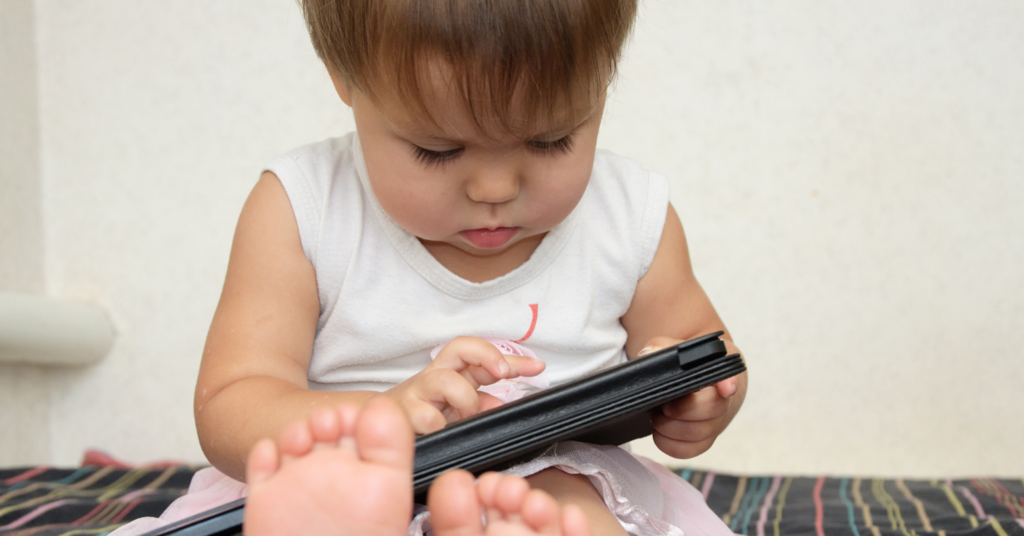 Toddler using tablet 